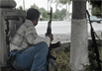 Вооруженный повстанец в Андижане. Фото АР