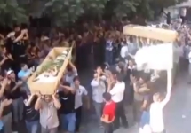 Похороны жертв конфликта в Сирии. Кадр CNN