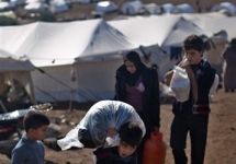 Лагерь сирийских беженцев. Фото: AP Photo/Khalil Hamra