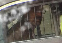 Фрейзер Гленн Гросс в полицейском автомобиле. Кадр NBC News