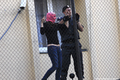 Приговор по делу Pussy Riot. Активистка Татьяна Романова на заборе посольства Турции