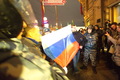 Задержание за разворачивание российского флага на акции в поддержку болотных узников. Фото: Ю.Тимофеев/Грани.Ру
