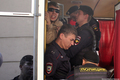 Задержанная демонстрантка в автозаке у Замоскворецкого райсуда в день приговора по Болотному делу четырех. Фото: Евгения Михеева/Грани.Ру