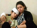 Сирия, Алеппо: Зейнаб Абдо и ее дочь.